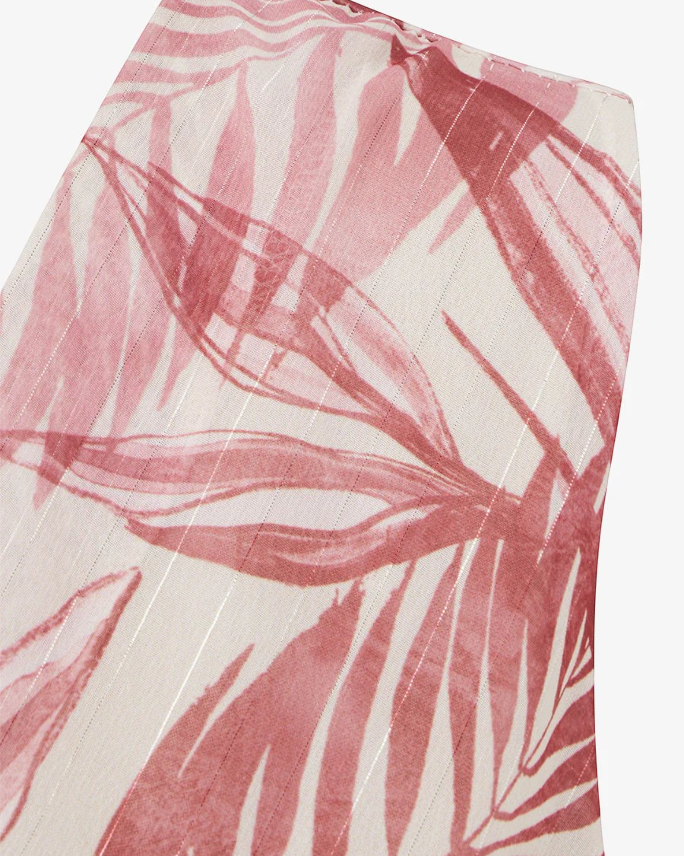 zevrion Aurora dress in antique pink with a delicate leaf print and shimmering iridescent metallic pinstripes