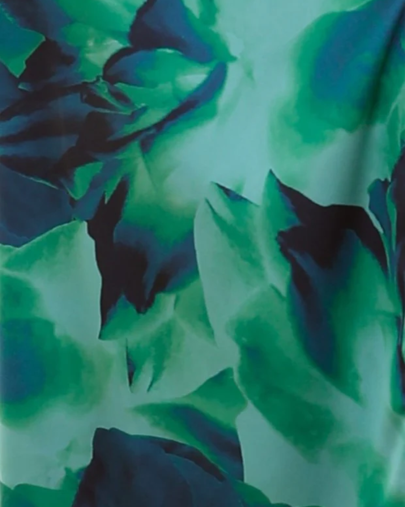 zevrion midi dress fabric featuring a vibrant green and dark teal abstract floral print in polyester blend