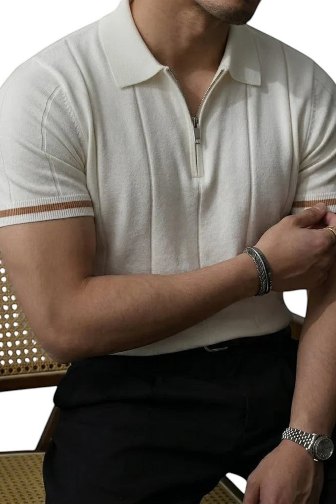 Zevrion Polo Eros premium white knit polo shirt with half-zip collar and striped sleeve cuffs on a man