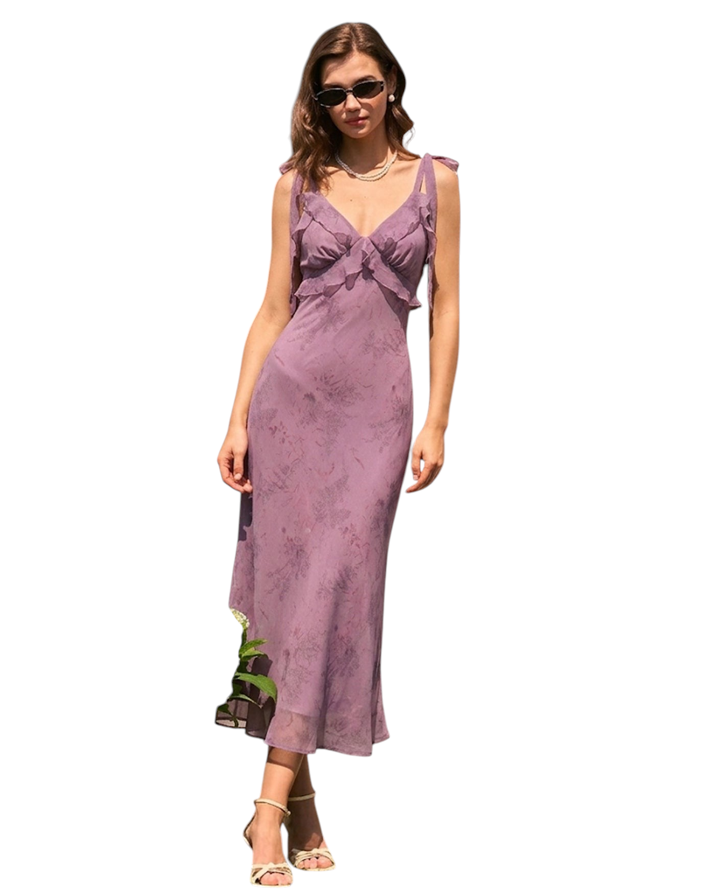 zevrion purple floral midi dress with spaghetti straps and ruffle details worn by a model in a garden setting
