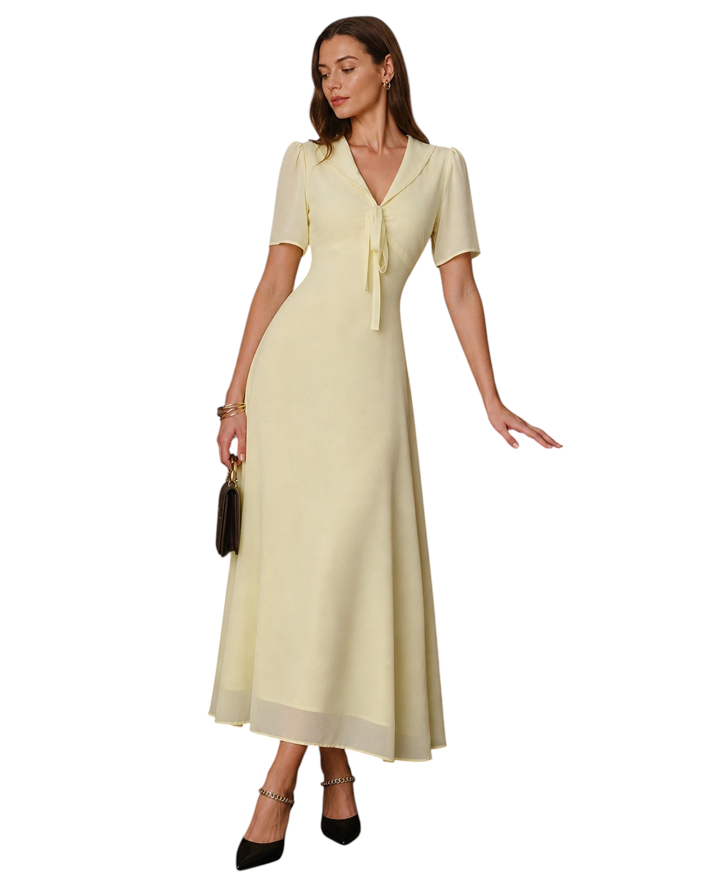 Model wearing a zevrion pale yellow maxi tunic dress with a V-neck, short sleeves, and decorative tie in a study.